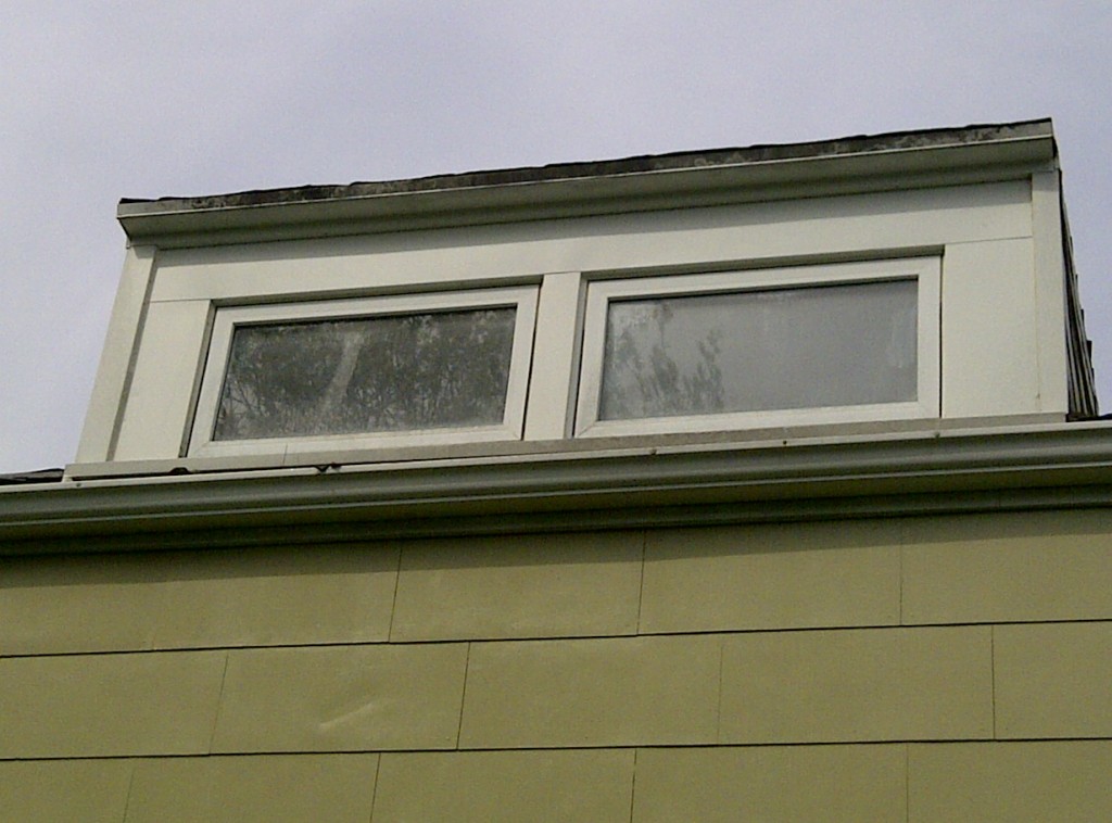 Dormer windows and siding on a home