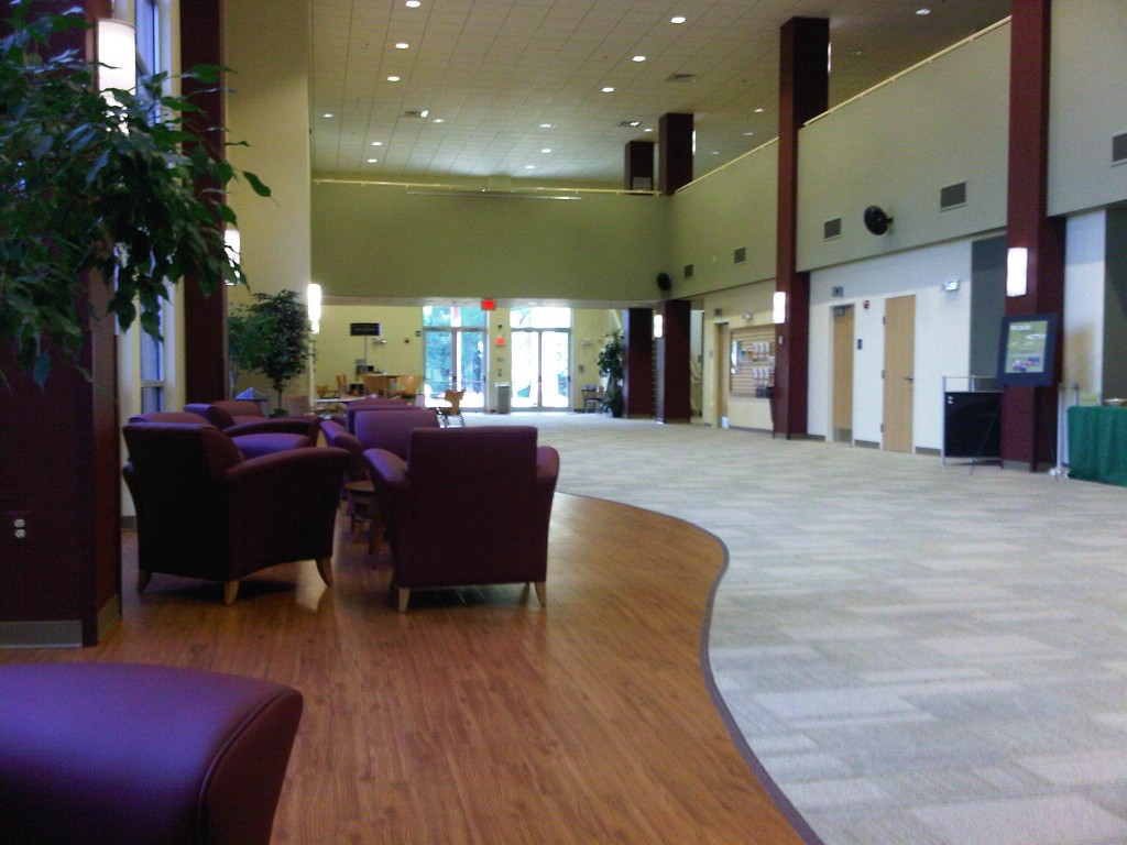 Large finished interior space with wood floors